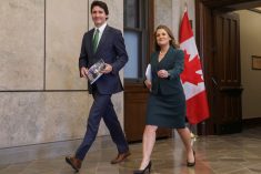 Prime Minister Justin Trudeau and Finance Minister Chrystia Freeland walk with copies of the 2023-24 budget on Parliament Hill in Ottawa on March 28, 2023. (Photo: Reuters/Patrick Doyle)