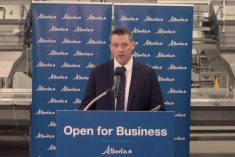Ag Minister Nate Horner speaks at the Harmony Beef plant at Balzac, Alta. on Feb. 7, 2023. (Government of Alberta video screengrab via YouTube)