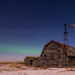 File photo of the northern lights over snow and stubble on a Saskatchewan field. (Nancy Anderson/iStock/Getty Images)