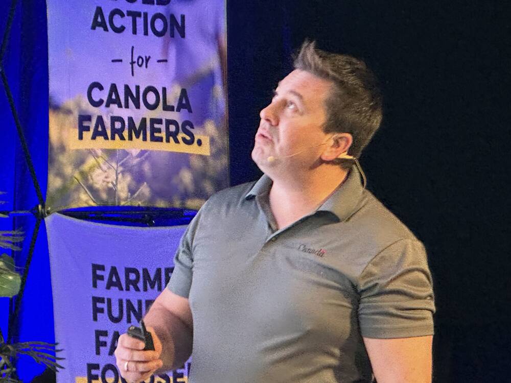 Tyler Wist from AAFC Saskatoon speaking at Manitoba AgDays 2025 about pests that affect canola.  PHOTO: Don Norman
