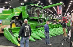 A John Deere combine sits on the show floor at the National Farm Machinery Show in Louisville, Kentucky, on Feb. 13, 2025.