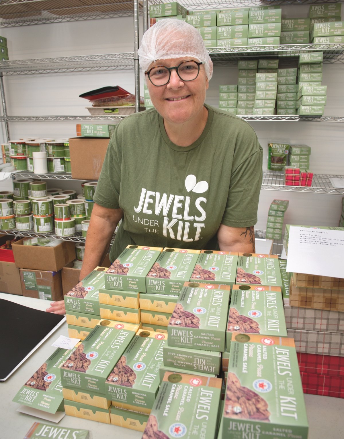 Elisabeth Burrow with boxes of her roasted nuts