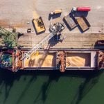 A bulk grain carrier ship is loaded in a port. Photo: sandsun/Getty Images Plus
