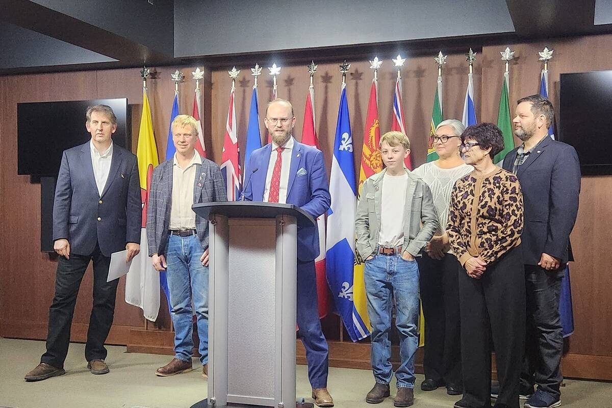 A press conference spotlighting the struggles of Canadian beekeepers took place in Ottawa Nov. 25.  Left to right: Peter Awram, Canadian Beekeepers Federation; Curtis Miedema, president, Alberta Beekeepers Commission; MP Arnold Viersen; Owen Miedema; Amber Ozero, director, Alberta Beekeepers Commission; Connie Phillips, executive director, Alberta Beekeepers Commission and Richard Ozero, Good Morning Honey. Photo: Joel Oosterman.
