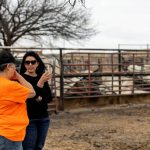 Oklahoma Secretary of Agriculture, Food and Forestry Blayne Arthur speaks with a rancher after intense wildfires, during a visit to northwest Oklahoma February 18, 2026. Photo: Oklahoma Department of Agriculture, Food and Forestry/Handout via REUTERS.
