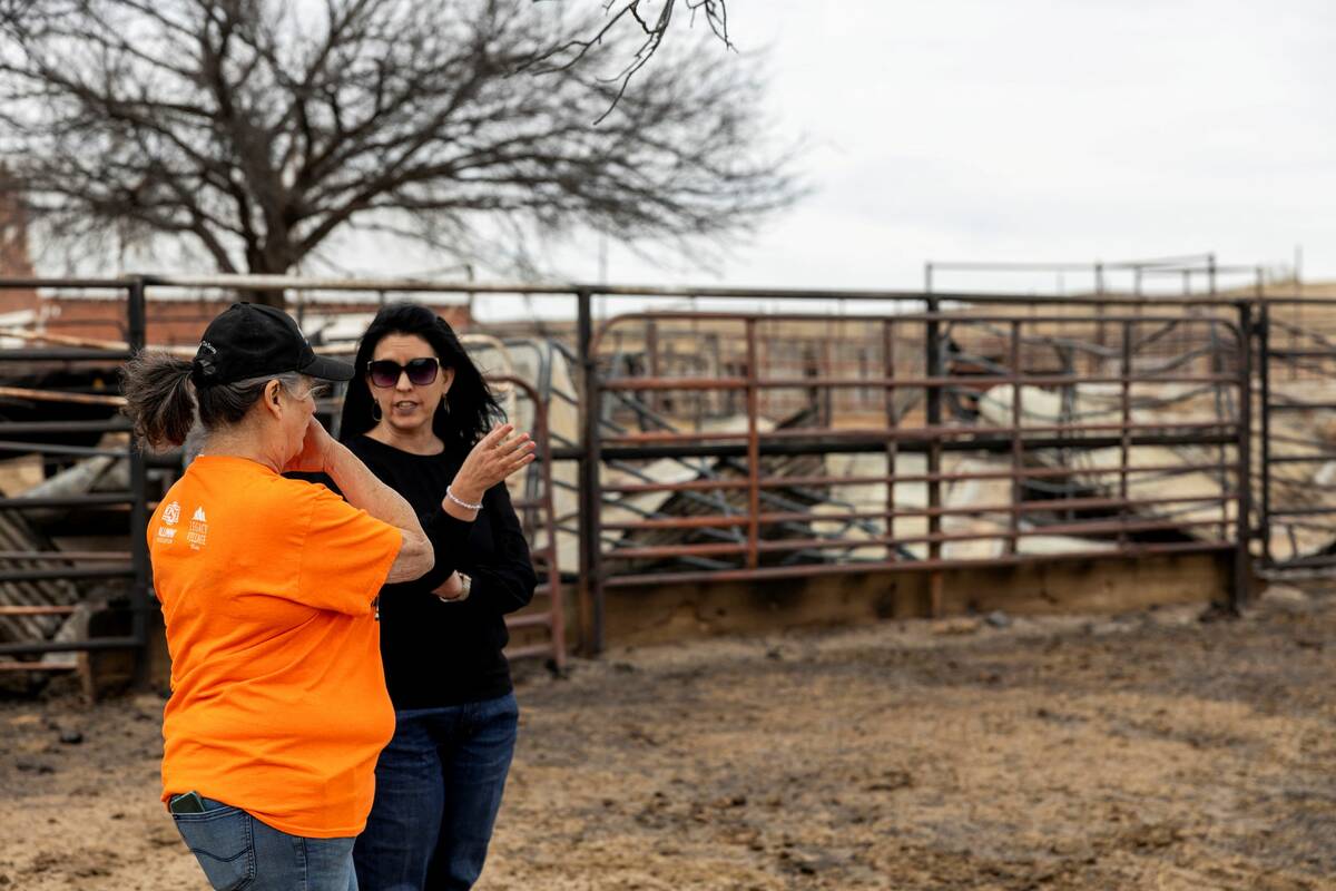 Oklahoma Secretary of Agriculture, Food and Forestry Blayne Arthur speaks with a rancher after intense wildfires, during a visit to northwest Oklahoma February 18, 2026. Photo: Oklahoma Department of Agriculture, Food and Forestry/Handout via REUTERS.
