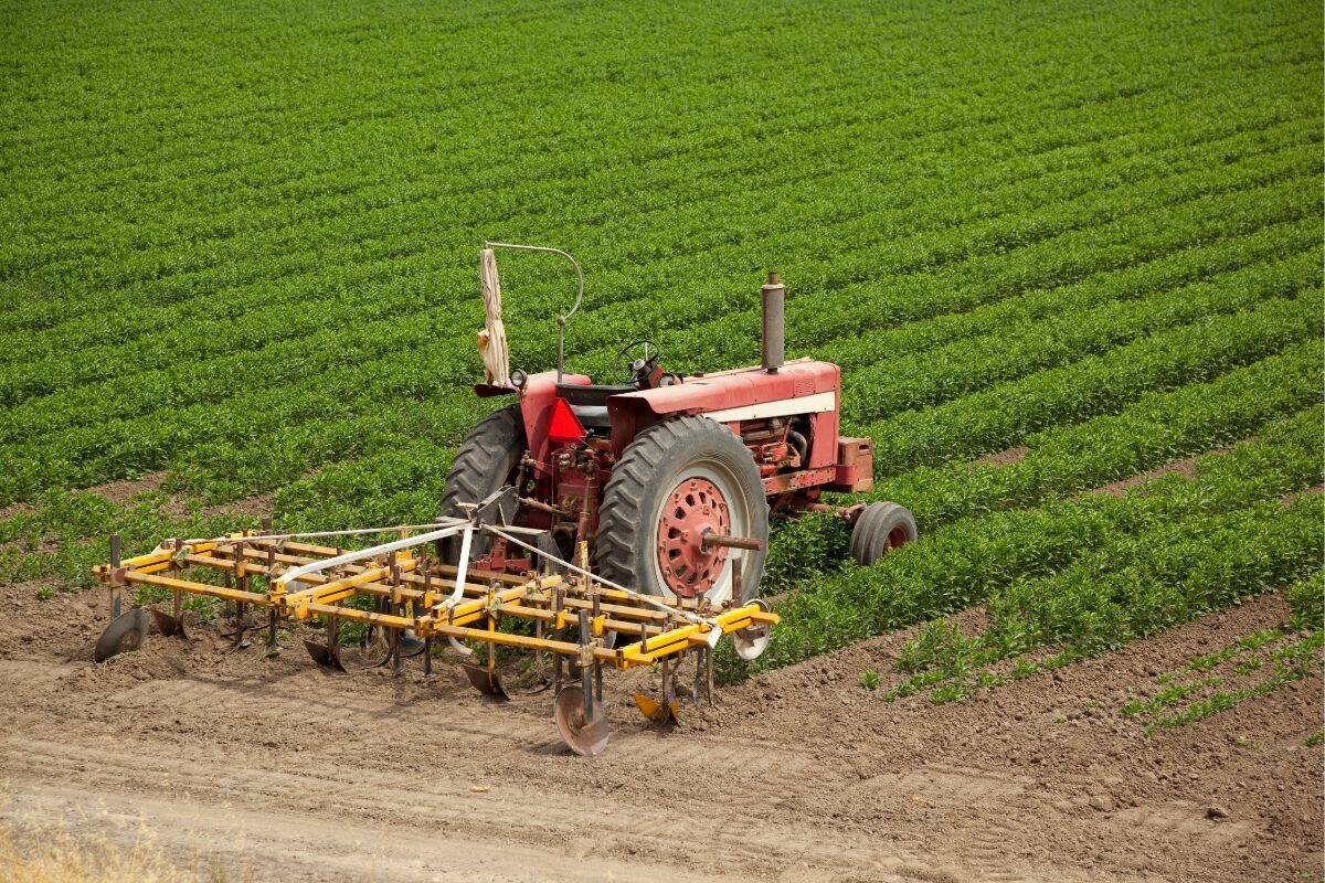 tractor sitting empty in field