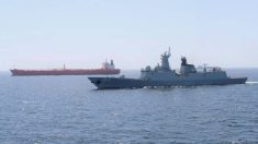 A Pakistan Navy ship escorts a Pakistani merchant vessel, as part of a maritime security operation, named Muhafiz-ul-Bahr, as regional tensions threaten key sea routes, amid the U.S.-Israeli conflict with Iran, at an unidentified location, released March 9, 2026, in this screen grab taken from a handout video. Photo: ISPR/Handout via REUTERS
