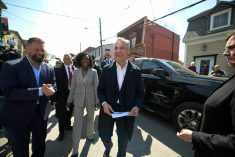 Prime Minister Mark Carney visits a local store with Liberal Party candidate Tatiana Auguste, ahead of the by-election in Terrebonne, Quebec, Canada April 9, 2026. Photo: REUTERS/Peter McCabe
